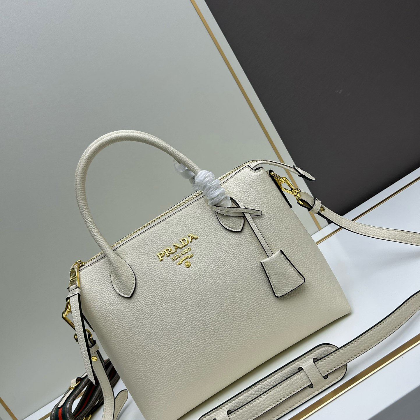 Pra*a top handle bags